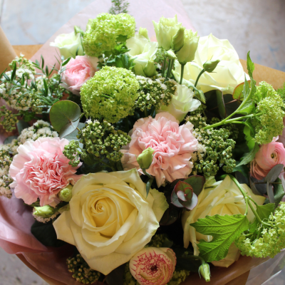 Mum in a Million bouquet - A beautiful selection of classic blooms in shades of pink and white.