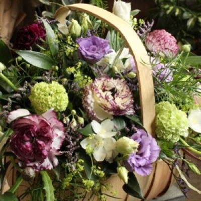 Designer's Choice Basket - A beautiful seasonal mixture of flowers chosen by the florist, arranged in a rustic trug basket.