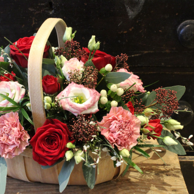True Love Basket - The true love basket is a beautiful, romantic selection of blooms arranged into a rustic trug basket.

Deluxe size pictured.

Please note that the flowers pictured are a seasonal selection and will differ due to availability. Our florists will choose the flowers based on the varieties available on the day and the colours and flowers will vary. If you have any specific requests then please contact us directly on 01204 697924 or email info@flowersmiths.org.uk.

Flowers are guaranteed for 5 days (although often last much longer). Please ensure the water is topped up regularly. Place flowers in a cool place away from direct sunshine or radiators.