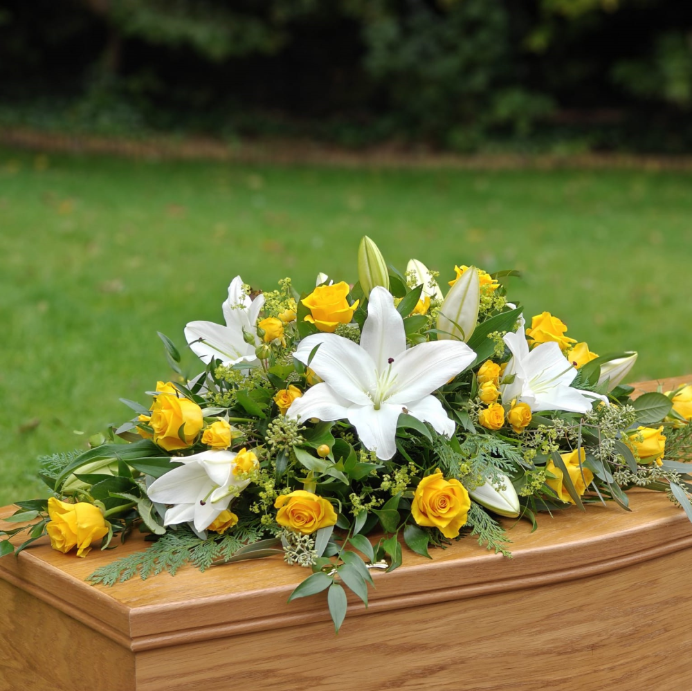 Lily and rose casket spray