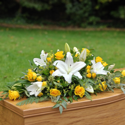 Lily and rose casket spray - A classic casket spray filled with elegant oriental lilies and large headed roses.  

Please state rose and lily colour preference when ordering - roses are available in red/yellow/pale pink/white/orange/cerise/blush/peach, lilies are available in white or pink

Sizing is as follows - 
Standard 3ft
Medium 4ft
Large 5ft
Extra large 5 1/2ft

For more information regarding funeral flowers Bolton or funeral flowers Horwich, please call the shop team on 01204 697924 or email info@flowersmiths.org.uk

Please note that we need at least 4 days notice prior to the funeral date when ordering this item.  For any last minute orders, please contact us directly before placing the order online.  Please specify funeral timings when placing the order.