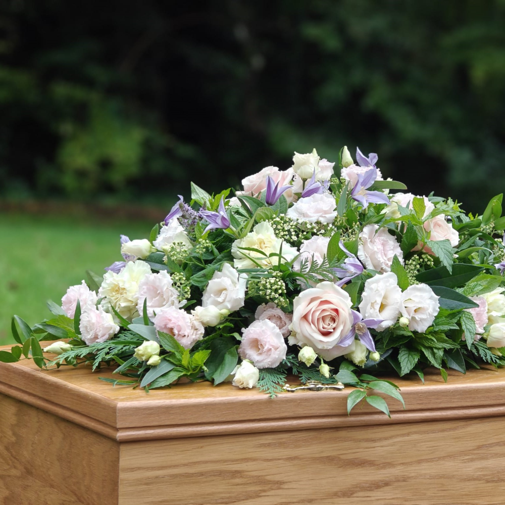 Pastel casket spray