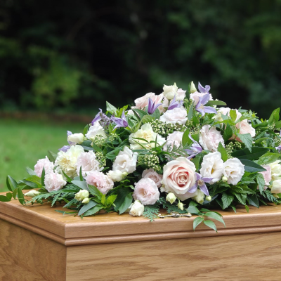 Pastel casket spray - A beautiful casket spray filled with a seasonal blooms in subtle pastel shades. Our team of talented florists will choose a selection of flowers and foliage depending on availability, choice may vary from the photograph. Sizing is as follows - Standard 3ft Medium 4ft Large 5ft Extra large 5 1/2ft For more information regarding funeral flowers Bolton or funeral flowers Horwich, please call the shop team on 01204 697924 or email info@flowersmiths.org.uk Please note that we need at least 4 days notice prior to the funeral date when ordering this item. For any last minute orders, please contact us directly before placing the order online. Please specify funeral timings when placing the order.